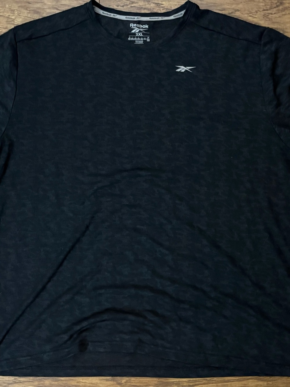 Reebok Men’s Black Long Sleeve Performance Tee with Subtle Logo